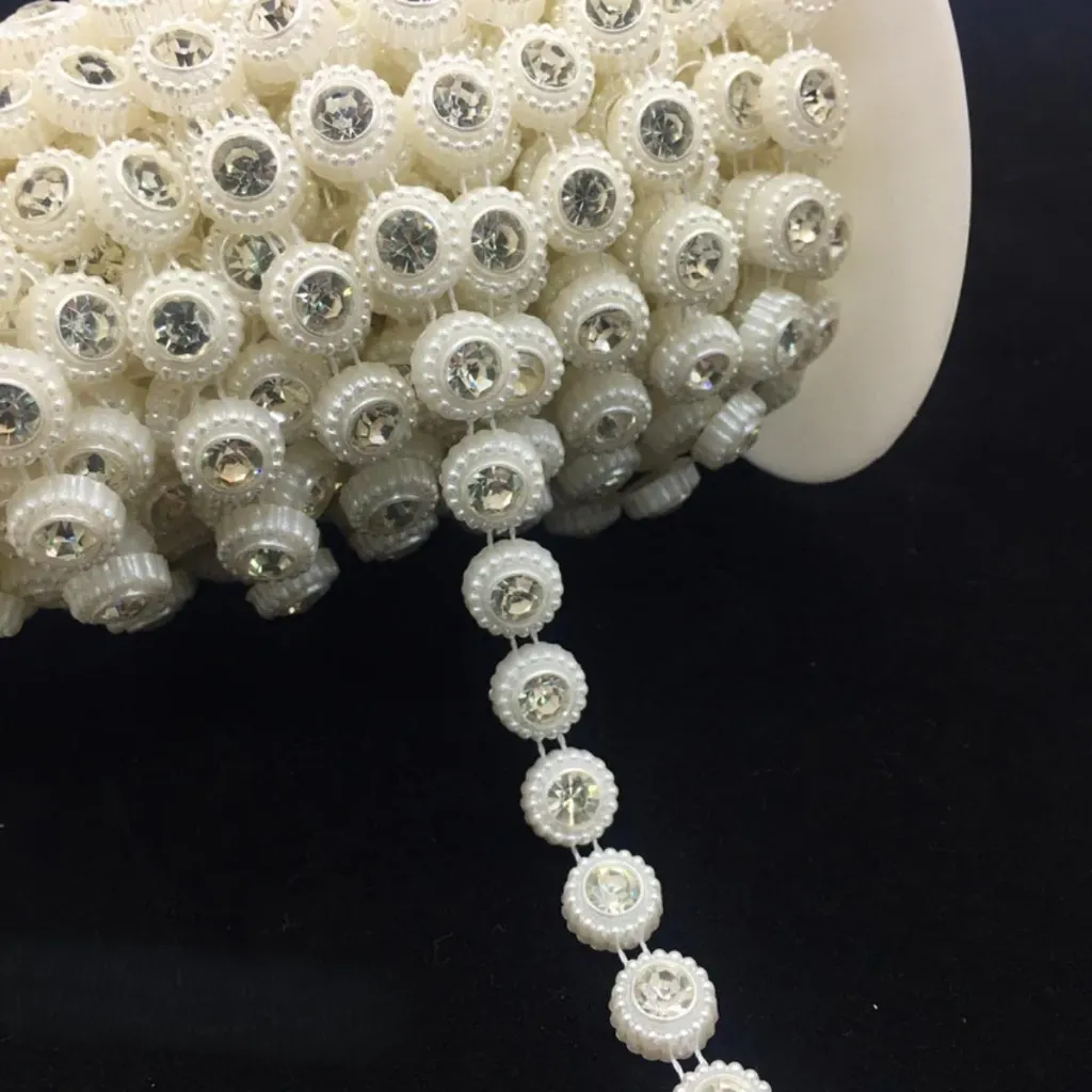 APLICACION DE PLASTICO ESPIRAL C/ PIEDRA BLANCO TRANSPARENTE 9006246N